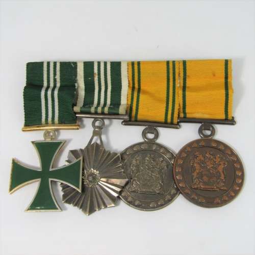 Set of 4 SA Prison Service medals issued to 12612 - H Warrant Officer IL Theunissen