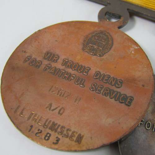 Set of 4 SA Prison Service medals issued to 12612 - H Warrant Officer IL Theunissen