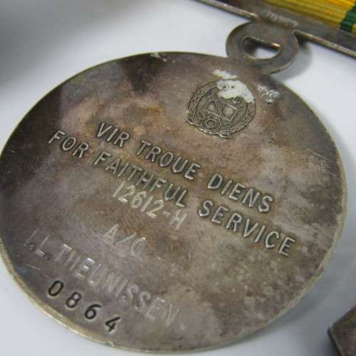 Set of 4 SA Prison Service medals issued to 12612 - H Warrant Officer IL Theunissen