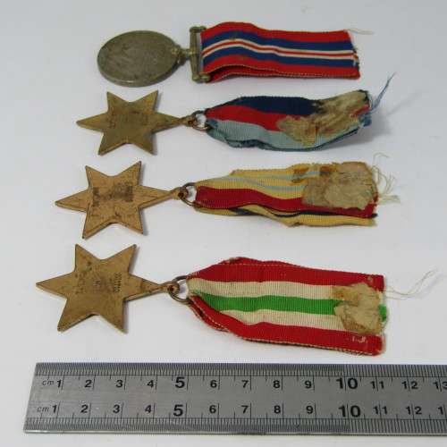 Set of 4 WW2 medals issued to M11710J. Scholtz