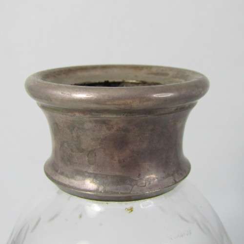 Beautiful vintage glass decanter with silver plated rim