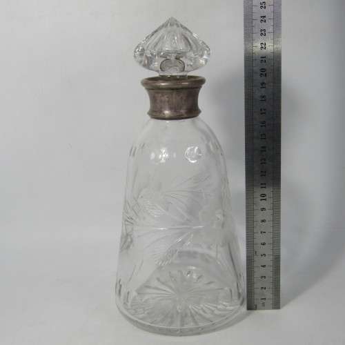 Beautiful vintage glass decanter with silver plated rim