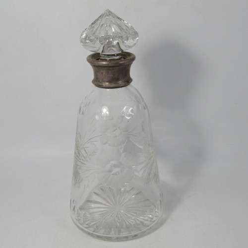 Beautiful vintage glass decanter with silver plated rim