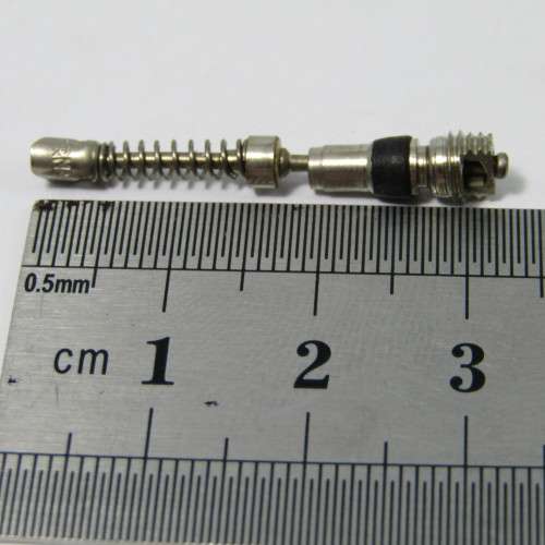 Vintage EHA 5 valve cores in original tin