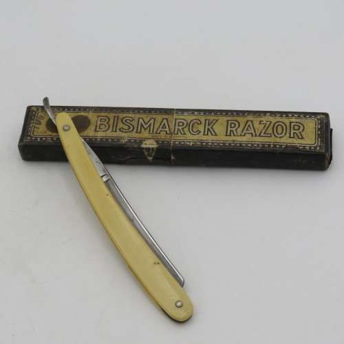 Vintage Bismarck cut throat straight razor in box-used
