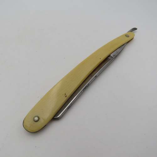 Vintage Bismarck cut throat straight razor in box-used