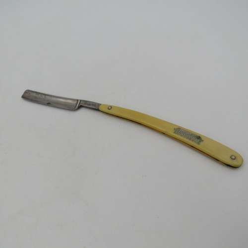 Vintage Bismarck cut throat straight razor in box-used