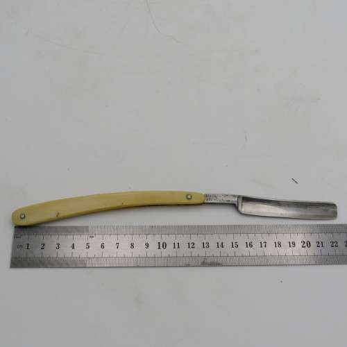 Vintage Bismarck cut throat straight razor in box-used