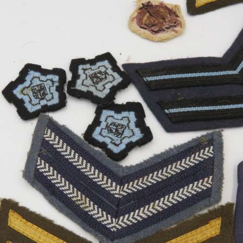 Large lot of military rank badges