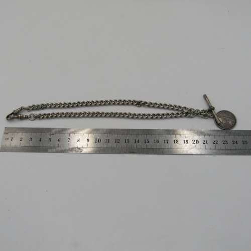 Antique hallmarked sterling silver fob chain with 1887 British  silver shilling - weighs 52,5 grams