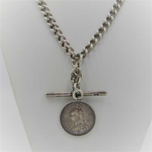Antique hallmarked sterling silver fob chain with 1887 British  silver shilling - weighs 52,5 grams