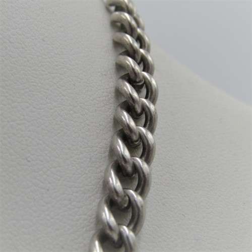 Antique hallmarked sterling silver fob chain with 1887 British  silver shilling - weighs 52,5 grams