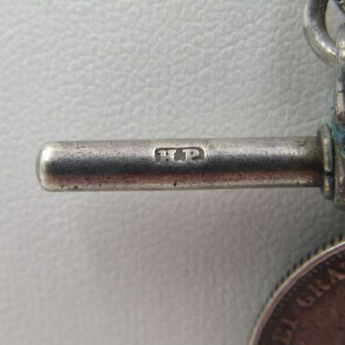 Antique hallmarked sterling silver fob chain with 1887 British  silver shilling - weighs 52,5 grams