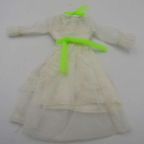 9 Pieces of Barbie and Barbie type doll clothing pieces from the 1960`s