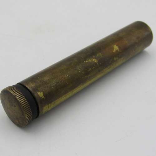 Vintage .303 brass oil bottle with markings on botton