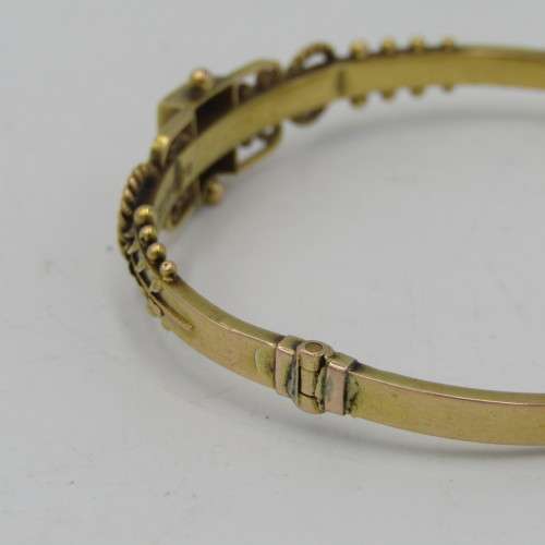 Antique 15kt gold bangle with 0,10ct diamond and two rubies - weighs 7,5 grams - circumference 17 cm