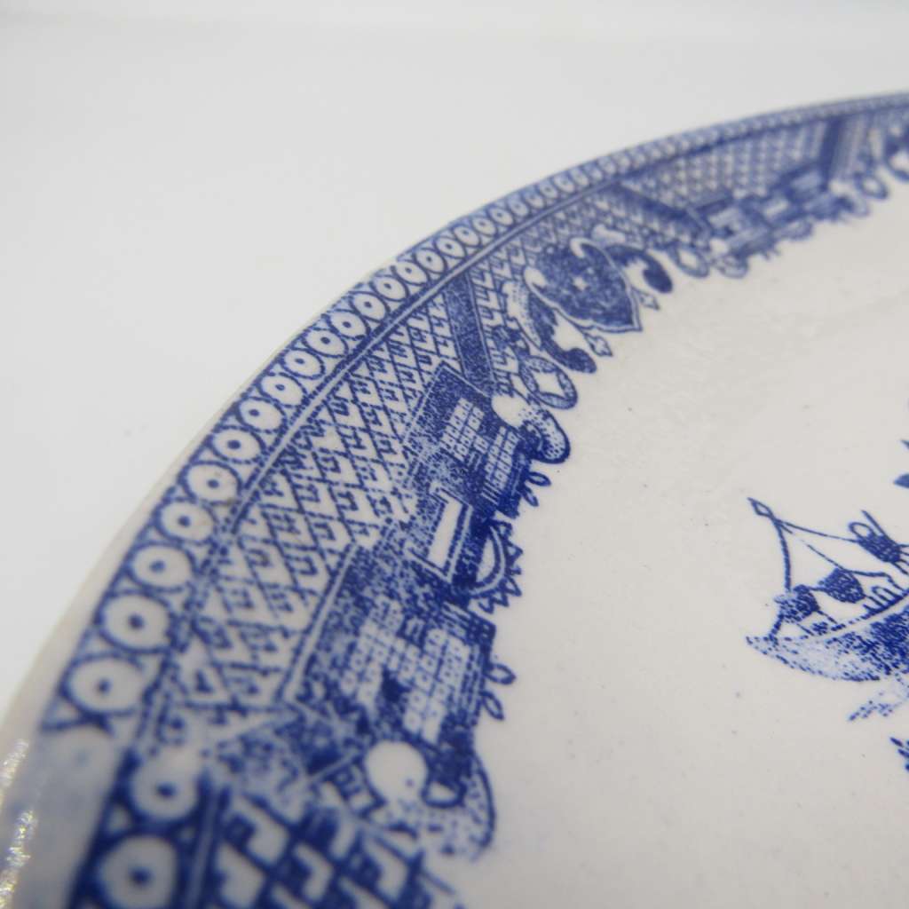 Antique Willow Pattern sauce boat and saucer