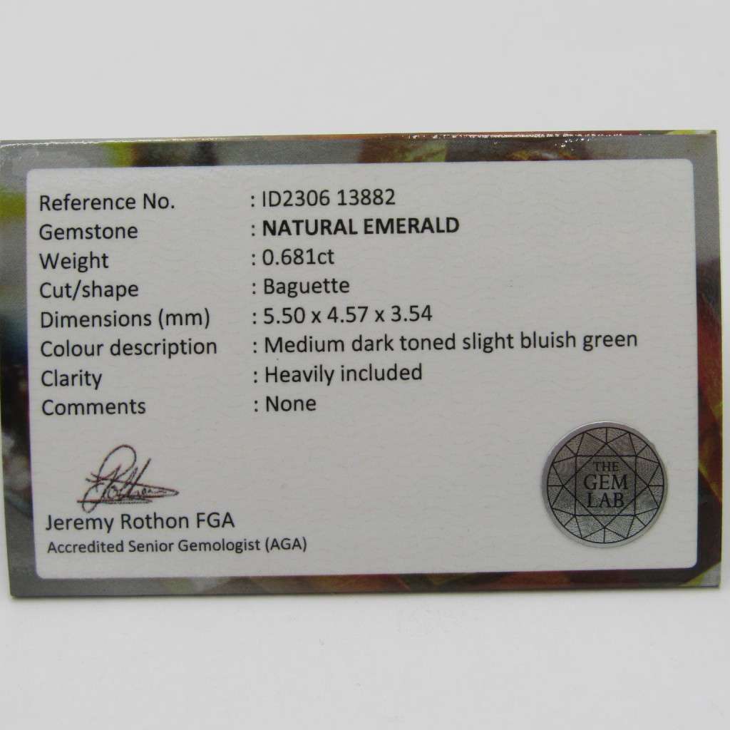 Natural Emerald of 0,68 carat Baguette shape medium dark toned slight bluish green