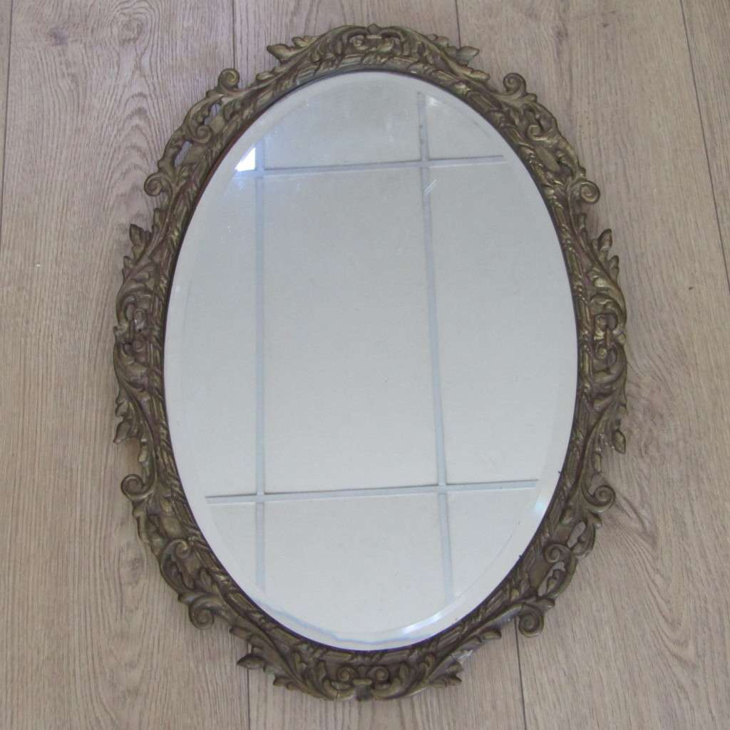 Vintage Oval bevelled mirror with ornate frame