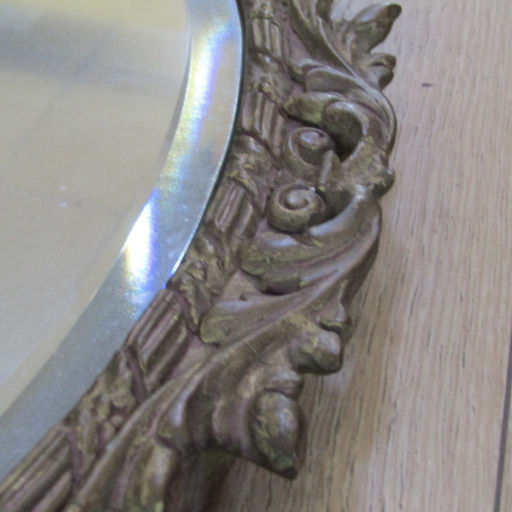 Vintage Oval bevelled mirror with ornate frame