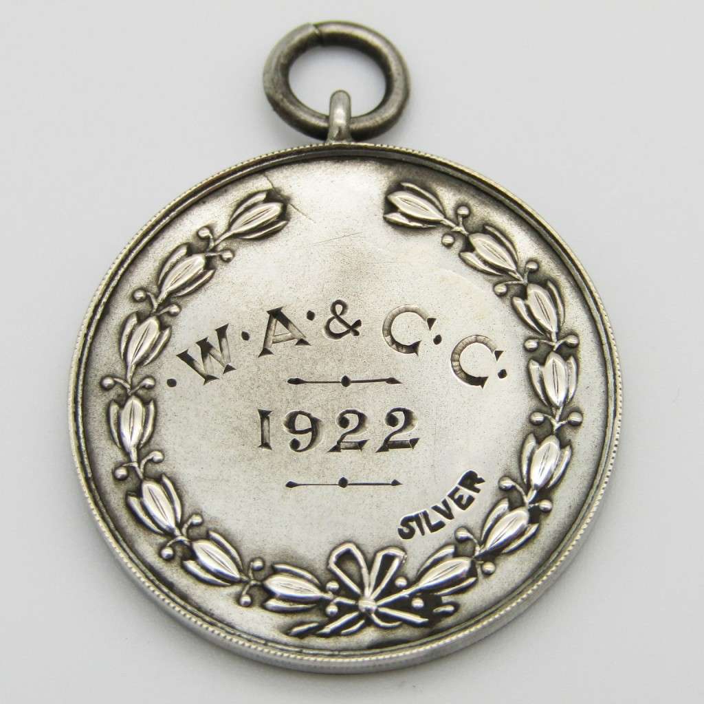 Antique W.A and C.C 1922 siver medallion