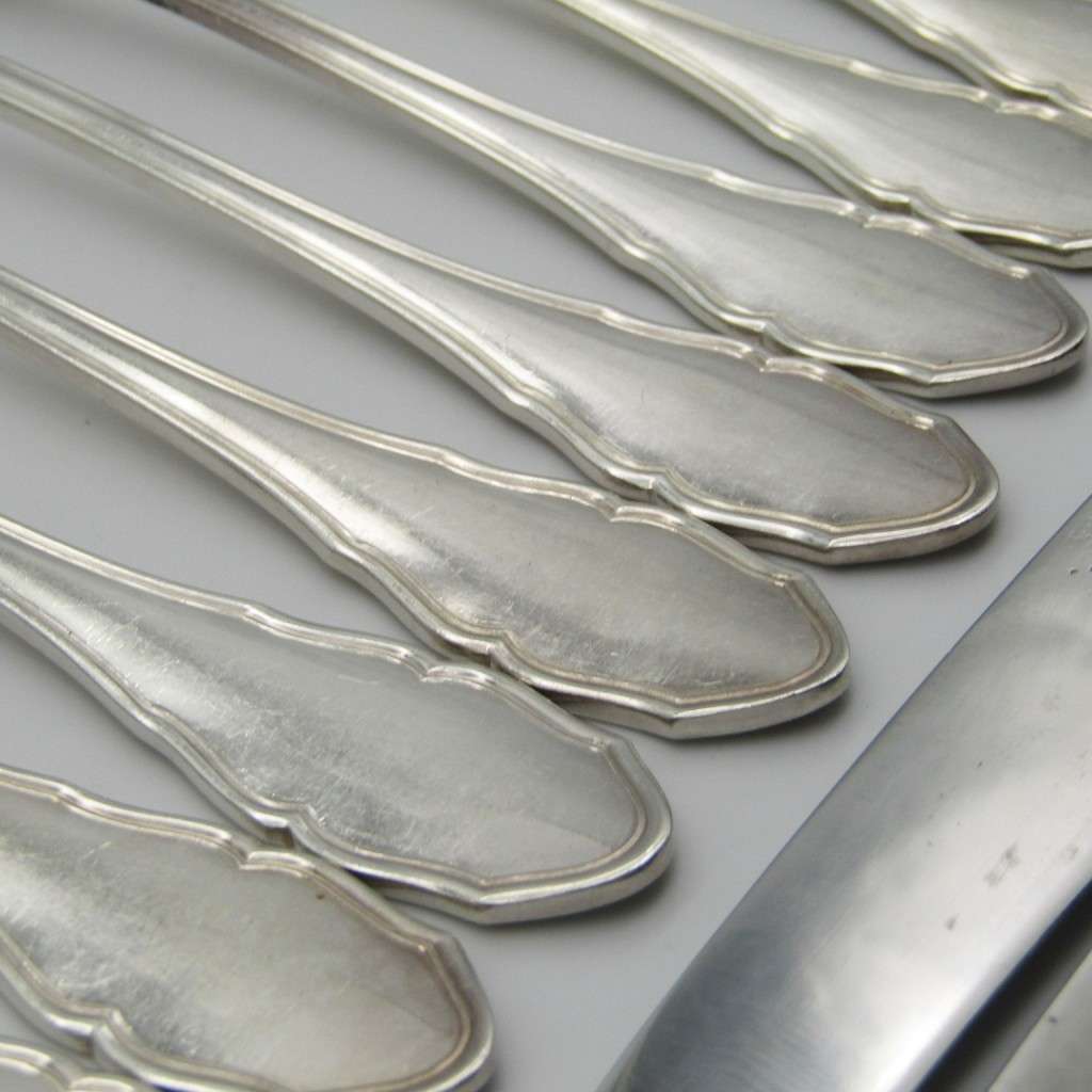 100 KKS German cutlery set with 11 knives / 12 forks / 11 spoons plated with about 140g of silver