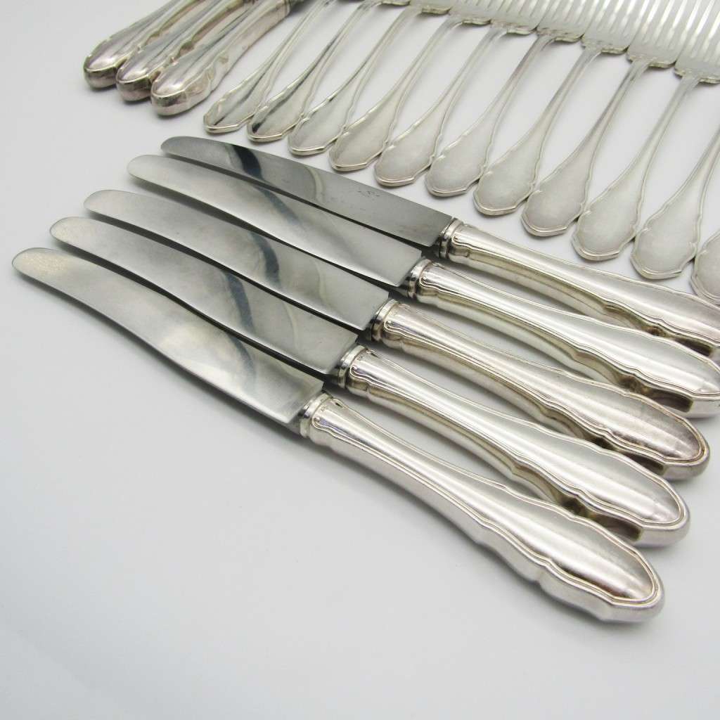 100 KKS German cutlery set with 11 knives / 12 forks / 11 spoons plated with about 140g of silver