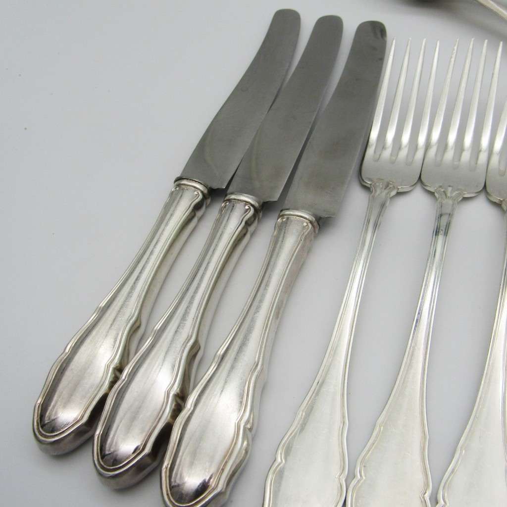 100 KKS German cutlery set with 11 knives / 12 forks / 11 spoons plated with about 140g of silver