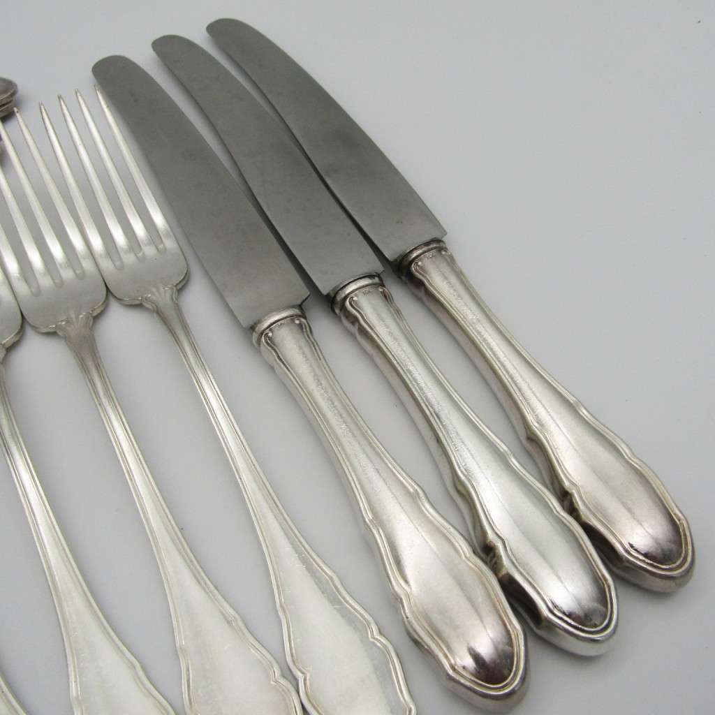 100 KKS German cutlery set with 11 knives / 12 forks / 11 spoons plated with about 140g of silver