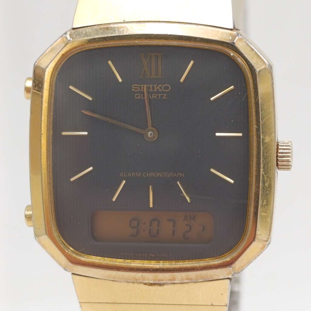 Vintage Seiko Quartz alarm-chronograph analog-digital gold colour mens watch - working