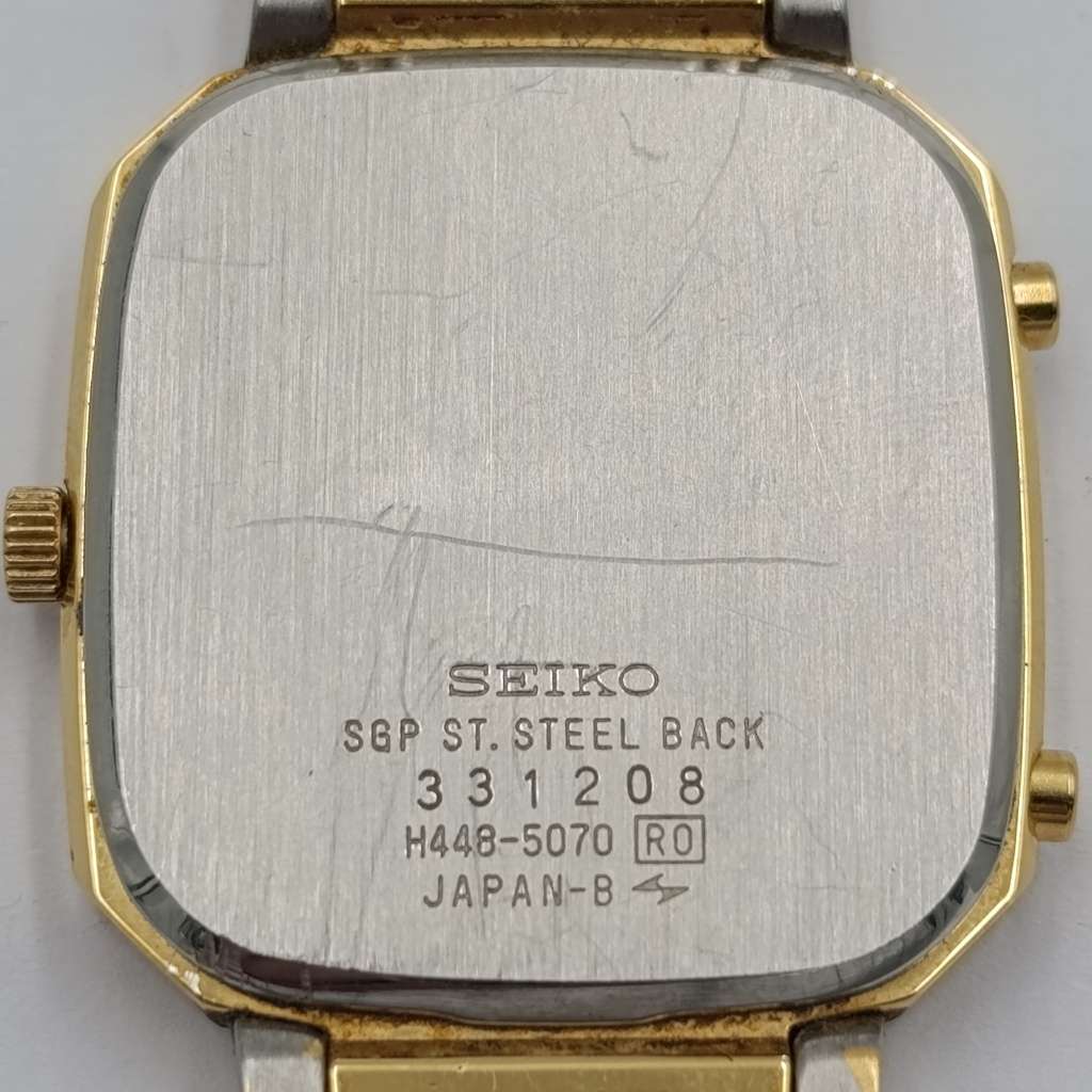 Vintage Seiko Quartz alarm-chronograph analog-digital gold colour mens watch - working