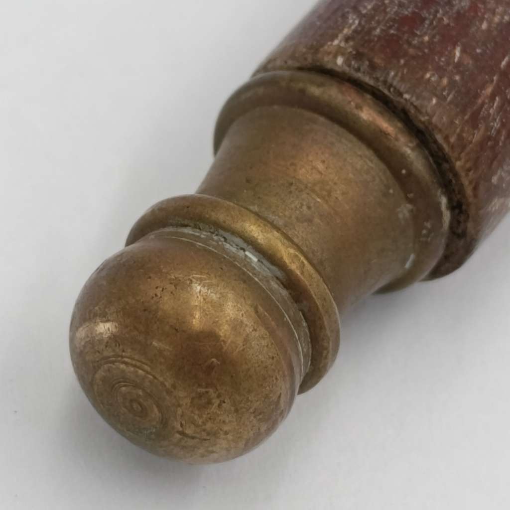 Vintage brass candle snuffer with wooden handle