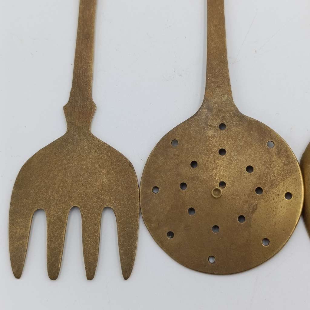 Set of vintage brass wall hanging utensils