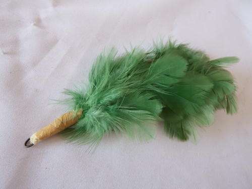 Feather worn on Italian military hat behind badge - as per photo