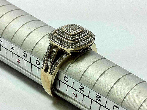 9kt gold dress ring with 113 small diamonds and 8 baguette diamonds on side - weighs 4.0g