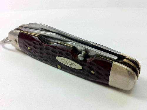 Vintage CASE XX USA pocket knife with red horn handle