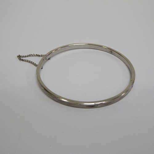 Vintage bangle with safety chain