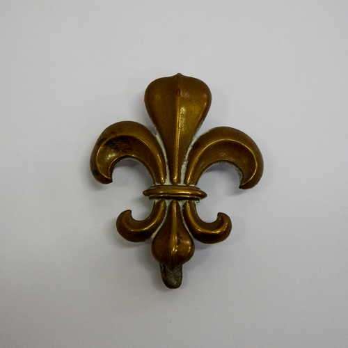Manchester regiment cap badge with slide