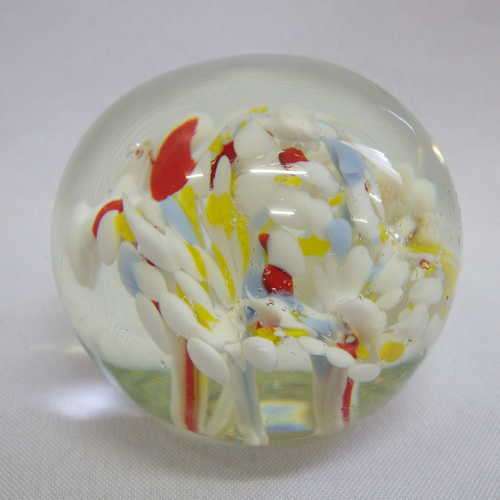 Glass paperweight with floral design
