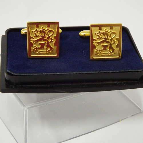 Pair of gold colour cufflinks in box