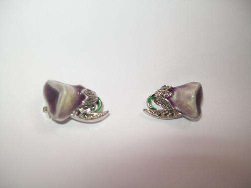 UNIQUE EARINGS....CLIP ON WITH STONES +- 50 YEARS OLD