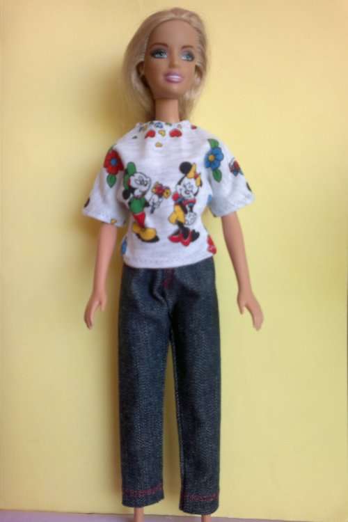 Barbie denim jeans and Disney T-shirt. (E)