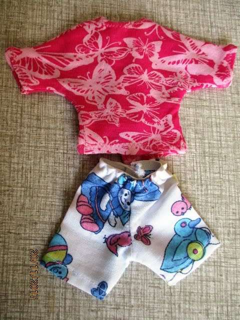 Barbie generic doll plus outfits.