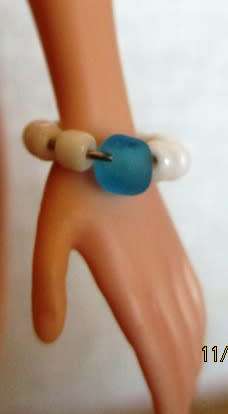 Barbie jewelry necklace with butterfly pendant and bracelet.