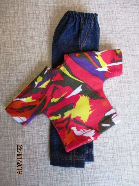 Ken - Barbie - denim jeans and red print T-shirt.