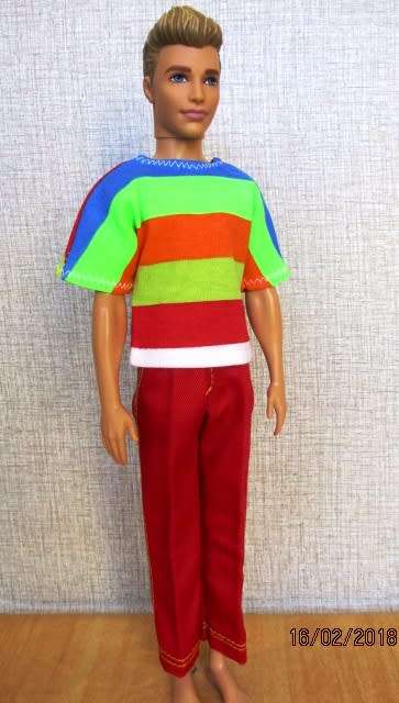 Ken - Barbie - red pants and bright striped T-shirt.