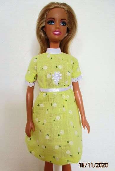 Barbie doll`s short sleeved dress - yellow flower
