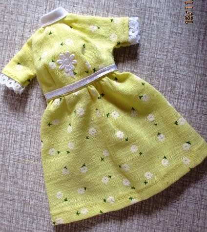 Barbie doll`s short sleeved dress - yellow flower