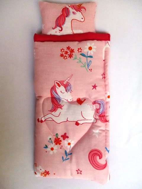 Barbie doll`s sleeping bag and nightie - unicorn pink
