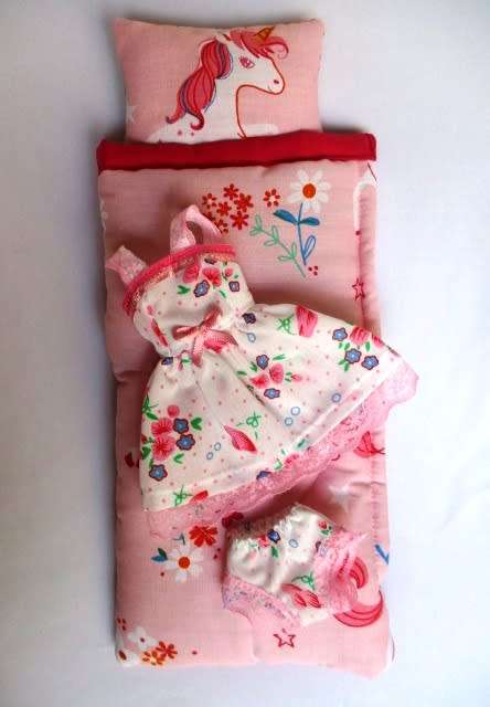 Barbie doll`s sleeping bag and nightie - unicorn pink